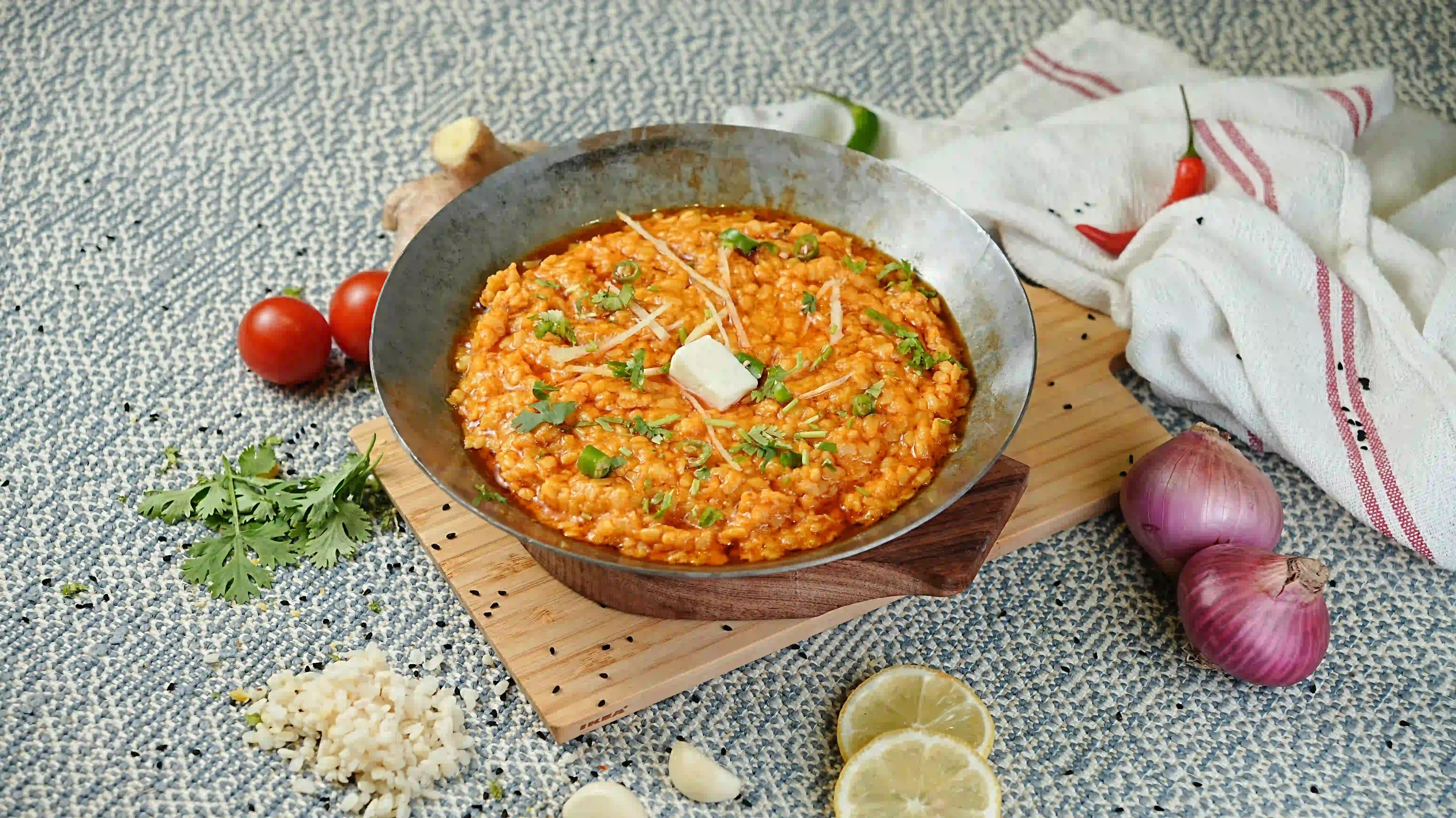 Daal mash finished with butter and ginger, from the weekly menu at Zafran Kitchen Ajman